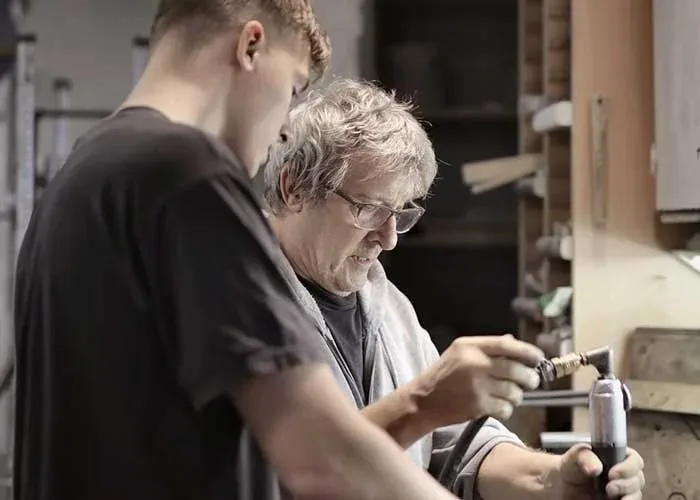 Plumbers working on an emergency plumbing repair